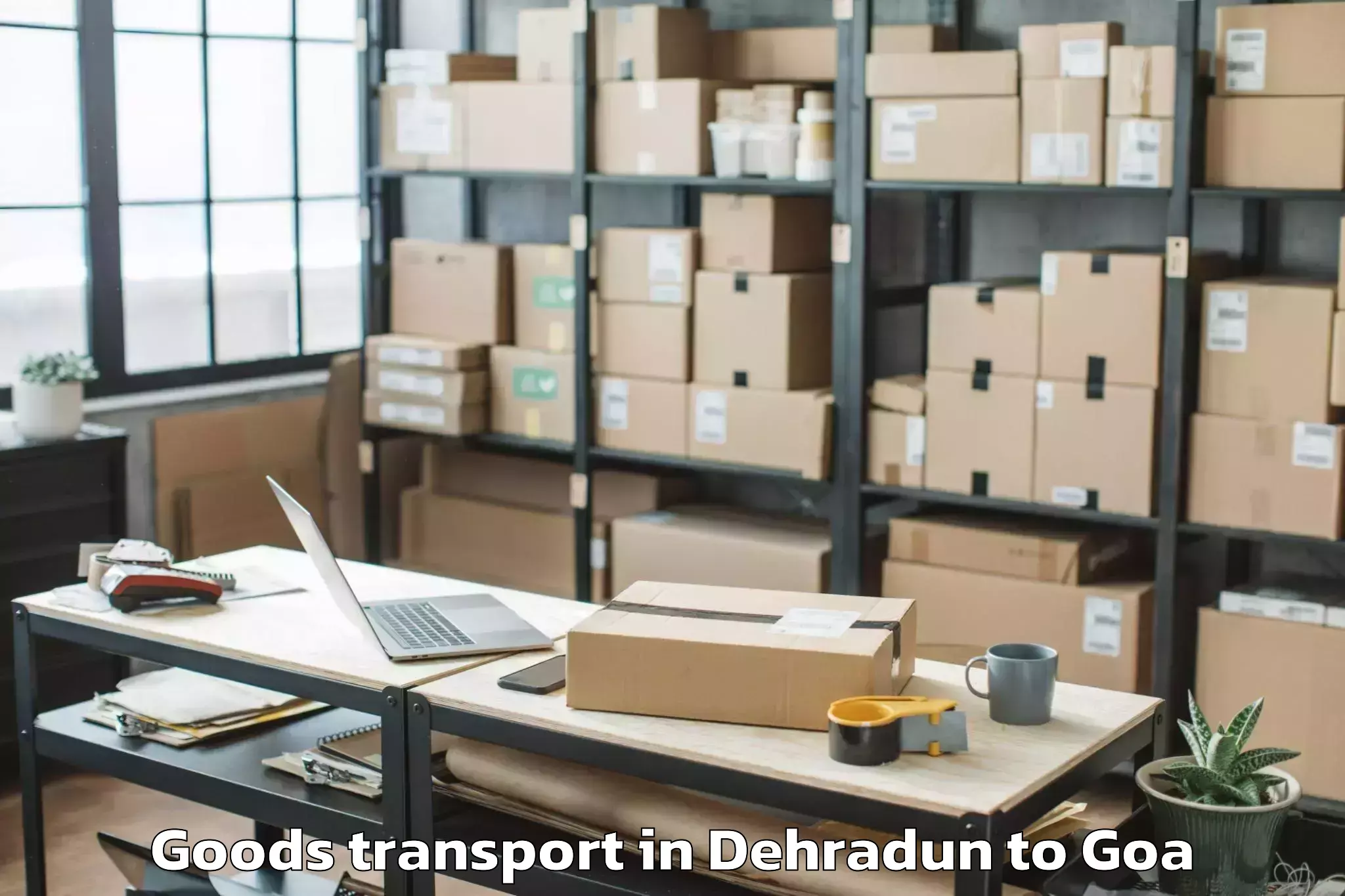 Affordable Dehradun to Mopa Goods Transport